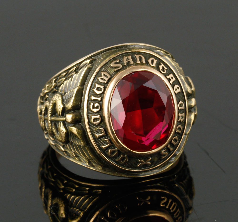 14K Gold Class Ring: College of the Holy Cross class ring, marked "Collegium Sanctae Crucis / 1952," 14K gold, 14 grams TW. Provenance: From the lifelong collection of Dr. Lester Jenkins of Lynn, Massachusetts.