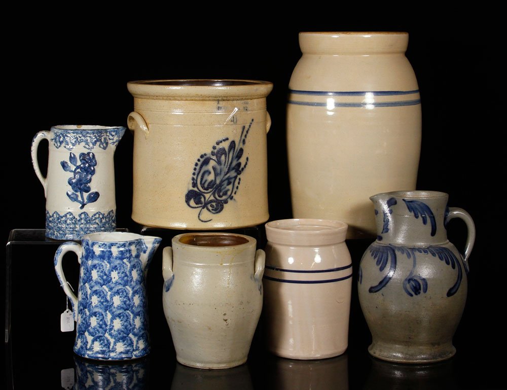 Lot of 7 Stoneware Crocks and Pitchers: Lot of seven crocks and pitchers, stoneware, to include: blue-decorated crock, from Bennington, VT, numbered "41" (11" h); and "Marshall Pottery 5" crock, from Marshall, Texas (16 1/2" h). Provenance: