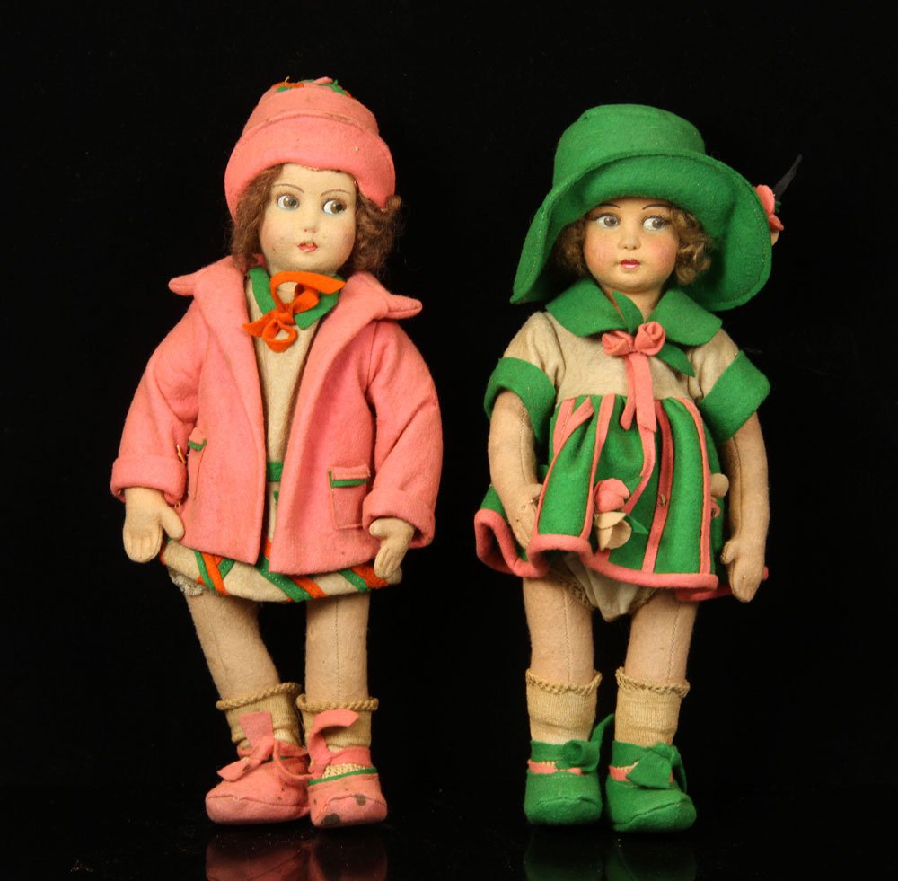 Lot of 2 French Cloth Dolls: Lot of two cloth dolls, French, by "Les Poupees Raynal," 13" h. Provenance: From a Massachusetts estate.