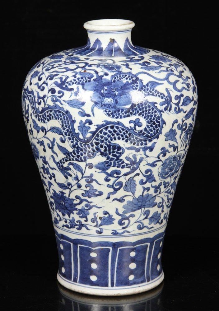 Qing Dynasty Chinese Blue and White Mei Vase: Late Qing Dynasty Chinese blue and white Mei vase, porcelain, decorated with two dragons against floral vine background, with Qianlong mark on base, 13" h. Provenance: From a Massachusetts estate.