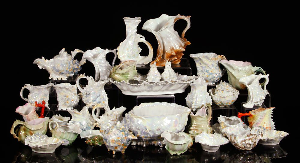 Collection of Royal Bayreuth 'Conch Shell' Porcelain: Large collection of Royal Bayreuth 'Conch Shell' porcelain, to include: pitchers, creamers, bowls, tray, spoon with warmers, candlestick, salt and peppers etc., 35 pieces total, not all pieces signed,