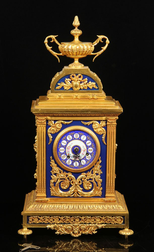 Sevres Mantle Clock: 19th century French Sevres mantle clock, ormolu bronze, includes key, 22" h x 8 1/2" w x 11 1/2" d. Provenance: from the private collection of a Newport Beach, California university professor and medi