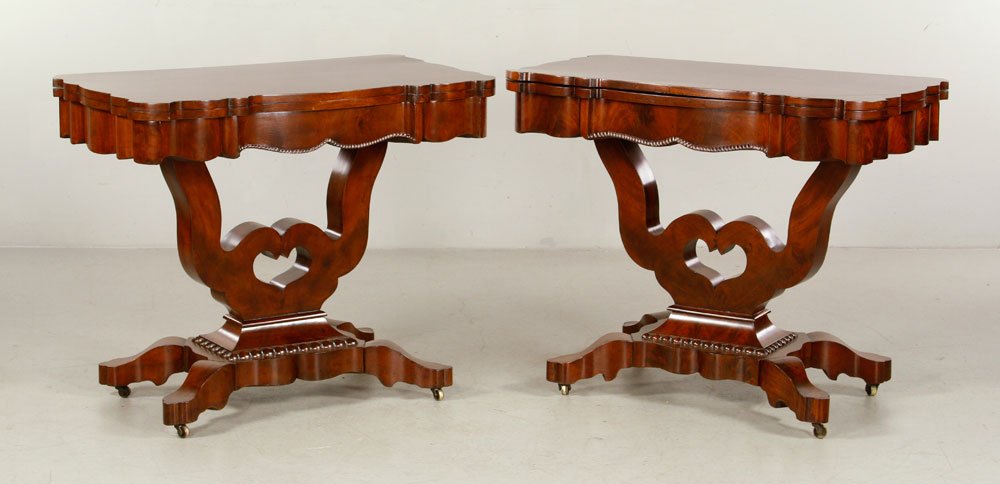 Pair of Edwardian Tables: Pair of 1920's Edwardian flip top tables, mahogany, 30" h x 36" w x 20" d. Provenance: from a New York estate.