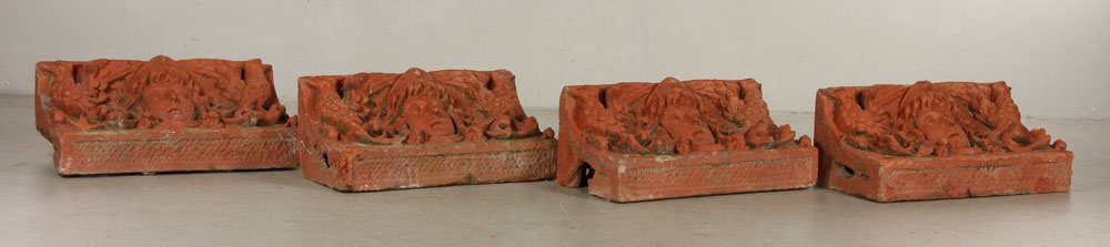 Architectural Terra Cotta Cornices: Late 19th century architectural cornices, terra cotta, having intricate detail, 24" h x 9" w x 12" h. Persian round tiles, hand painted with bird decoration, 8 1/4" dia. Provenance: from the private c