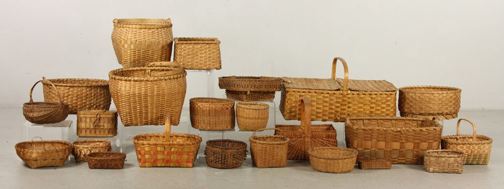 Lot of Baskets: Lot of 23 antique baskets, wicker, 6" h x 20" w x 11" d (largest). Provenance: from a California estate.