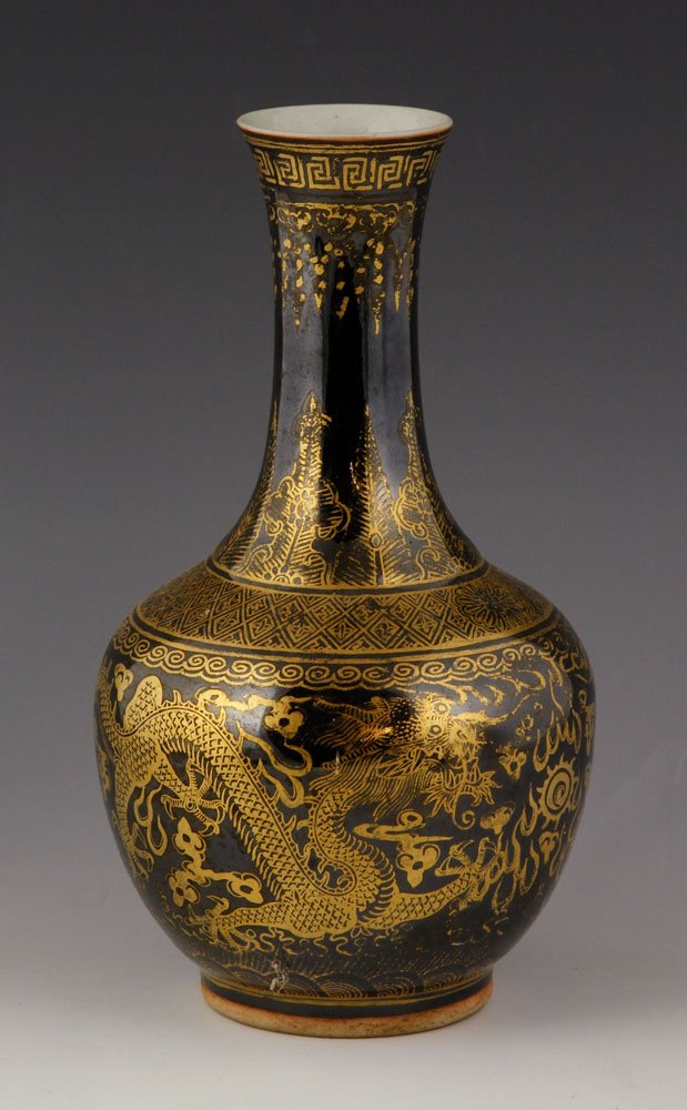18th to 19th C. Chinese Vase: 18th to 19th century vase, Chinese, black with gold design, 8" h x 4 1/2" w. Provenance: From the estate of the late Harry Reed Everson, an avid collector from Marblehead, Massachusetts.