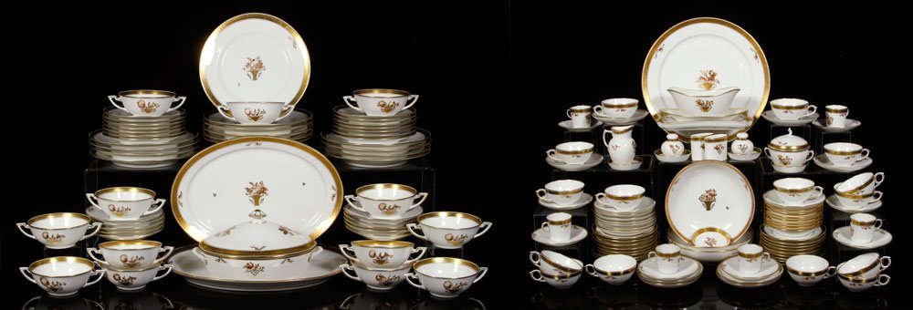 Set of Royal Copenhagen Dinnerware: Large set of Royal Copenhagen dinnerware, decorated with gold border and baskets of flowers.