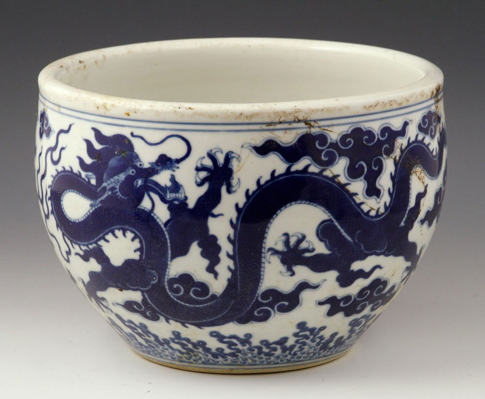 19th C. Chinese Dragon Bowl: 19th century bowl, Chinese, decorated with five-clawed dragon motif, 7" h x 9 1/2" dia. Provenance: From the estate of the late Harry Reed Everson, an avid collector, from Marblehead, MA.