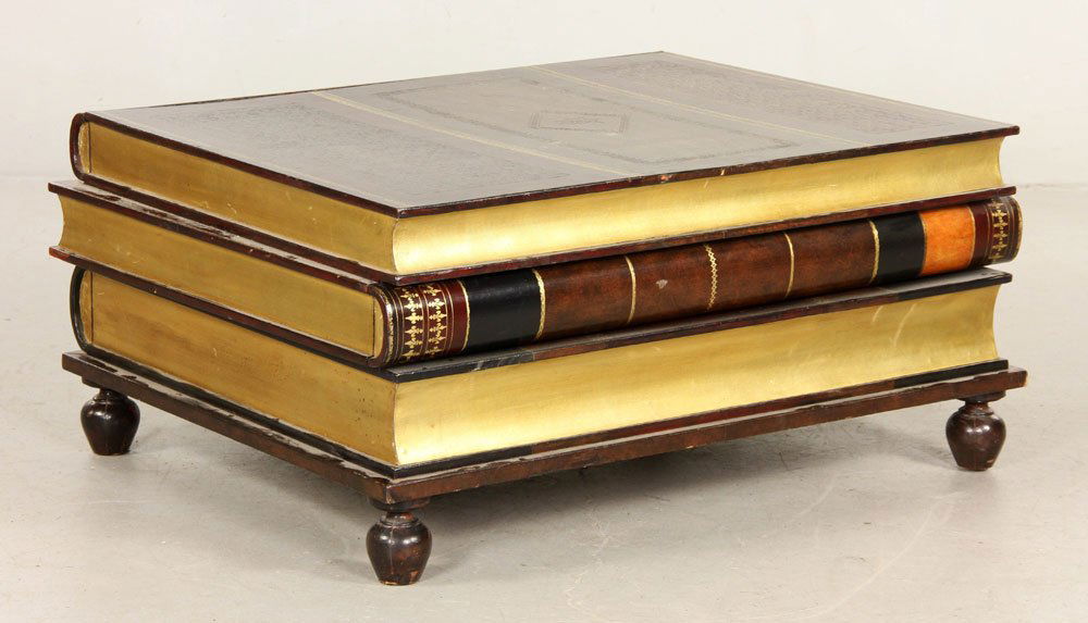 Book Form Coffee Table: Book form coffee table, with two drawers being the book bindings, 16 1/2" h x 36 1/2" w x 28" w. Provenance: From the collection of interior designer Thomas Britt.