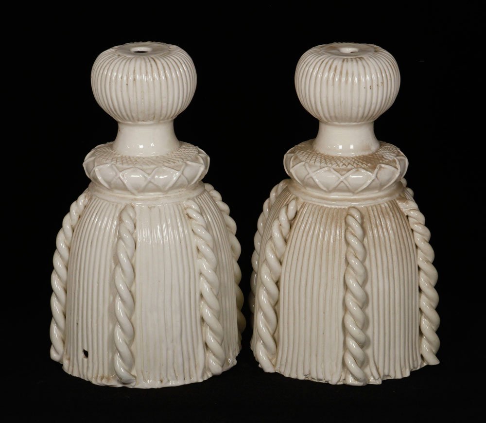Pr. Decorative Porcelain Objects: Pair of decorative objects, white porcelain, 14" h x 10" dia. Provenance: From the collection of interior designer Thomas Britt.
