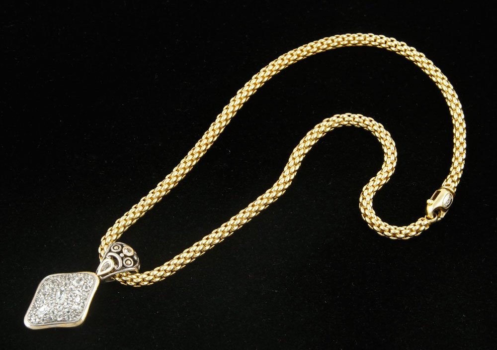 18K Gold Necklace with John Hardy Pendant: Necklace with John Hardy (Bali artisan) pendant, 18K yellow gold, sterling silver and faux diamond; necklace, 15" l, approximately 21 grams TW; pendant, 1 1/2" h, approximately .4 troy oz TW. Provenan