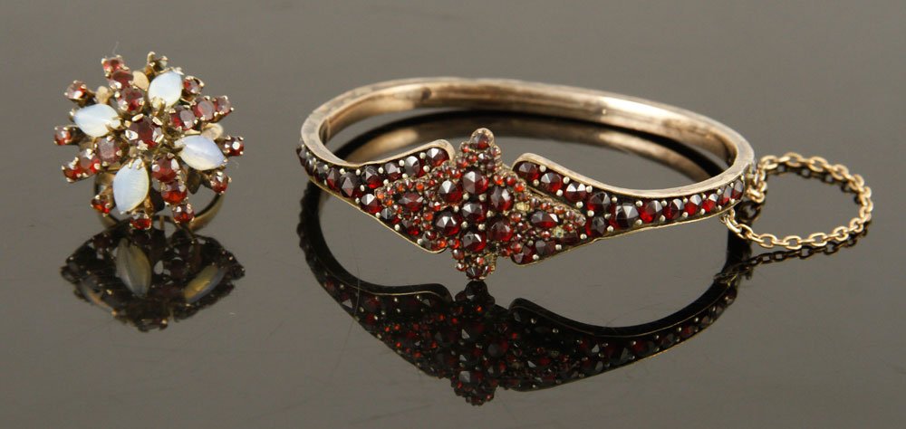 Antique Garnet Bracelet and Ring: Antique garnet bracelet, gold filled, with 14K gold, garnet and moonstone ring, size 6, approximately 5 grams TW (ring). Provenance: From a Massachusetts collection.