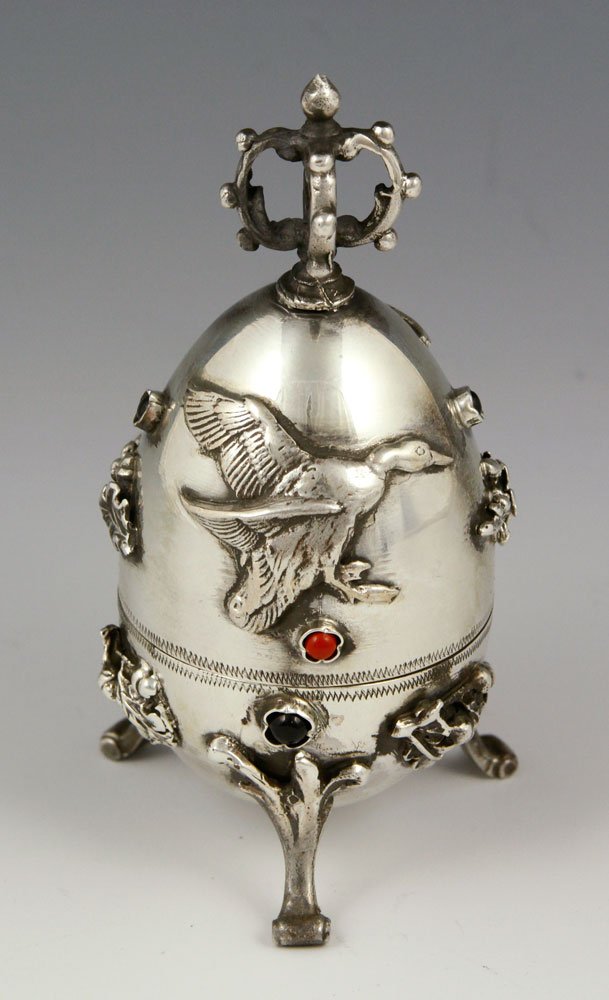 Russian Silver Hunting Egg: Hunting egg with dachshund and ducks, Russian, 84 silver, hallmarked 84 (.875 silver) and BC / 1873, 4" h, approximately 4.0 troy oz TW. Provenance: From a Connecticut collection.