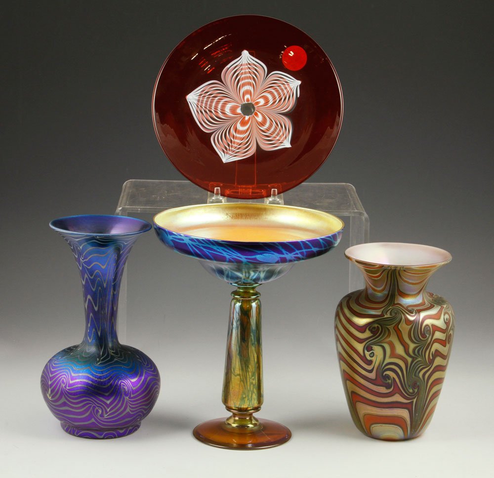 Lot of Durand Art Glass: Lot of two Durand art glass pieces, to include: one King Tut vase and one compote (8 1/4" h); plus one Durand plate (7 1/2" dia) and a contemporary multi-colored vase; four pieces total. Provenance: F