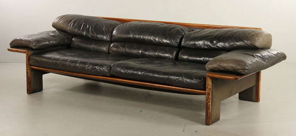 Mid-Century Modern Black Leather Sofa: Mid-century modern sofa, black leather upholstery, 27" h x 95" l x 39" d (wooden frame). Provenance: From a California estate.