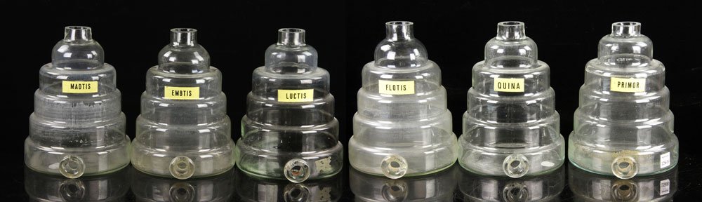 French Apothecary Jars: Lot of five apothecary jars, French, glass, 11" h x 8" dia (base). Provenance: From a Massachusetts estate.