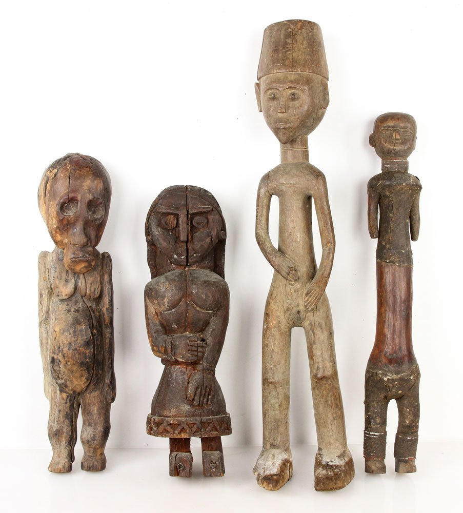 4 Antique Carved African Figures: Lot of four antique figures, African, carved wood, 28" h (largest).