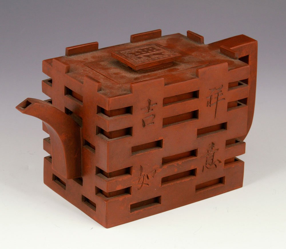 Chinese Yixing Pottery Teapot: Chinese Yixing pottery teapot, rectangular, carved double happiness on body, Fu character on finial, 4 1/4" h x 8 3/4" dia.