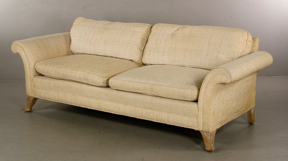 Robsjohn-Gibbings Sofa: T. H. Robsjohn-Gibbings sofa, with carved arms and reversible back, legs carved with Greek revival design, with textured upholstery, 37" h x 88" w x 29" d. Provenance: From the estate of Purdon Smith 