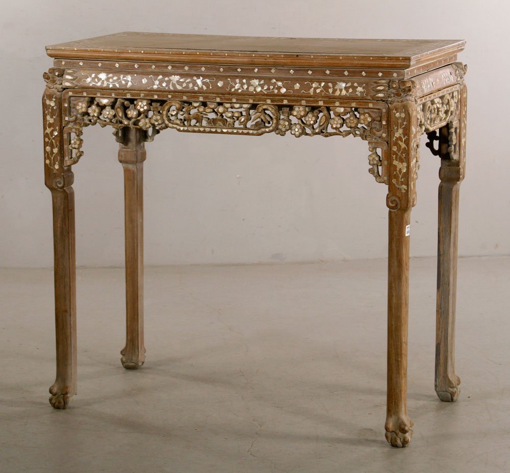 Chinese Whitewash Table: Carved Chinese table, whitewashed with mother of pearl inlay, ball and claw feet, 38" h x 38 1/2" w x 19" d. Provenance: From the estate of interior designer Thomas Britt.