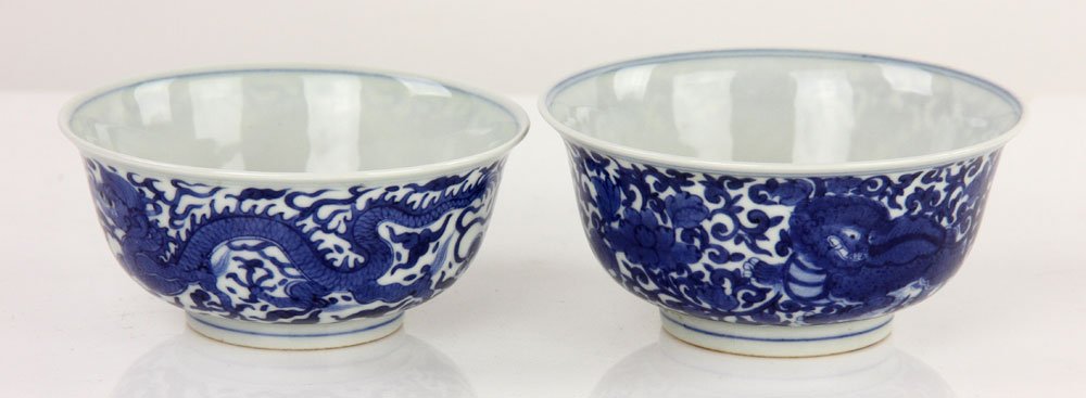 Pr. Chinese Blue and White Bowls: Pair of Chinese blue and white bowls, with dragon design, six-character mark on base, 1 1/2" h x 3 3/4" w.
