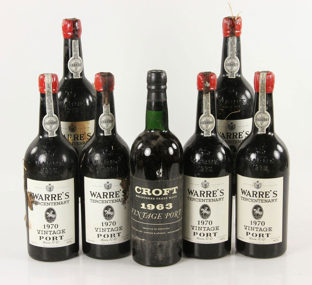 7 Bottles of Vintage Port: One bottle of 1963 Croft Vintage Port and six bottles of 1970 Warre's Vintage Port. Provenance: From a Massachusetts estate.
