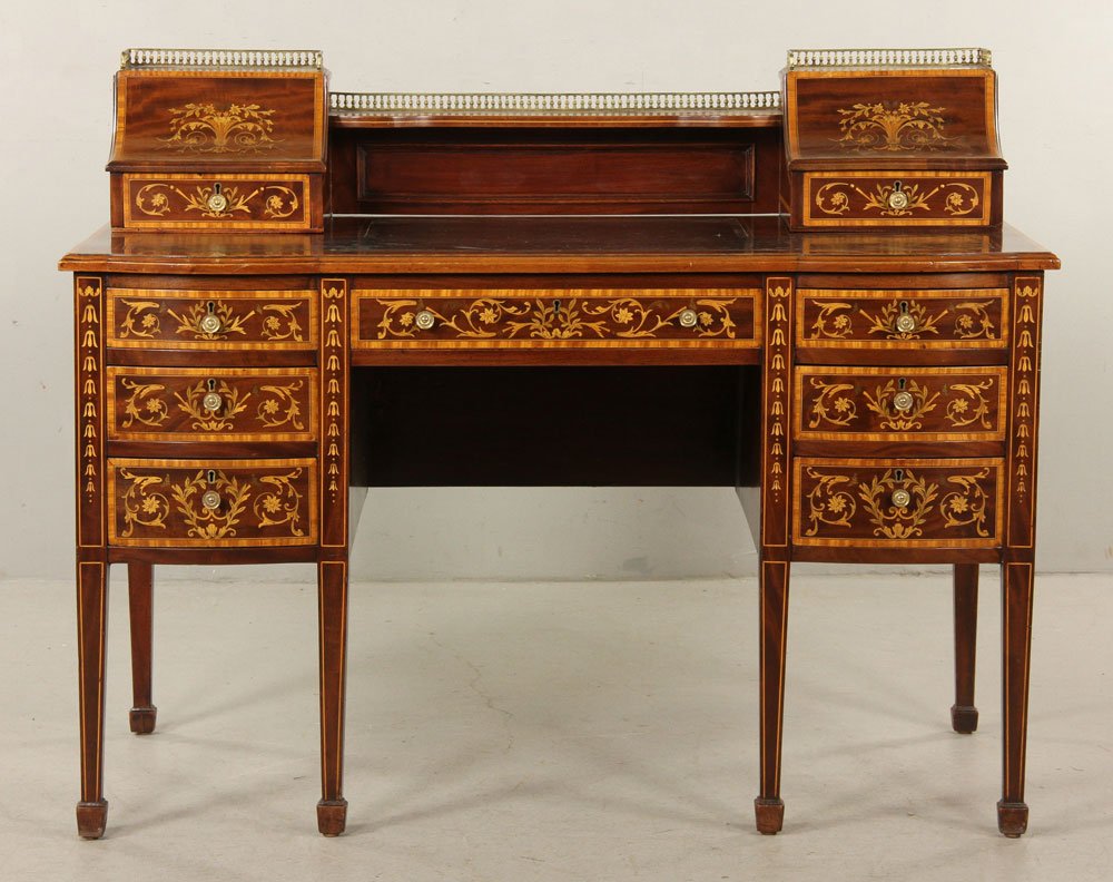 Edwardian Marquetry Desk: Edwardian period desk, marquetry inlaid mahogany with leather top, circa 1900, 38" h x 49" w x 25" d. Provenance: from a New York collection.