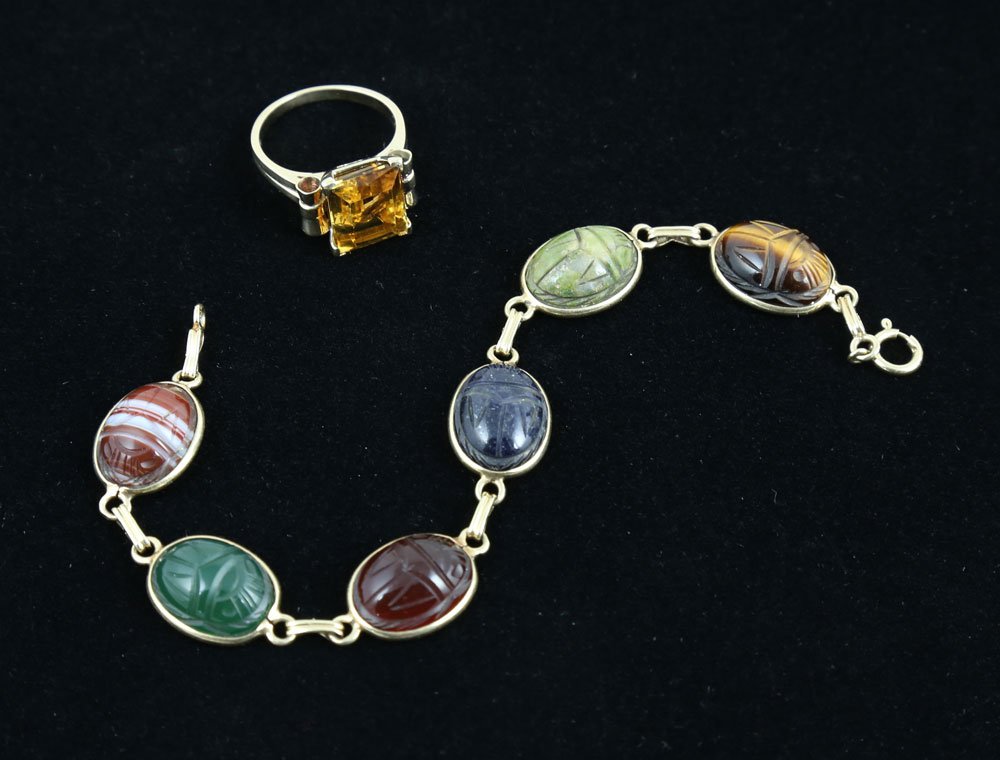 1950's Tiffany and Co. Bracelet and Ring: Two 1950's Tiffany and Co. pieces, to include: scarab bracelet, 14K yellow gold, having six hand-carved quartz stones in the shape of a scarab beetle, each 12.5mm x 17mm, bezel-set, 7 1/2" l, approxim