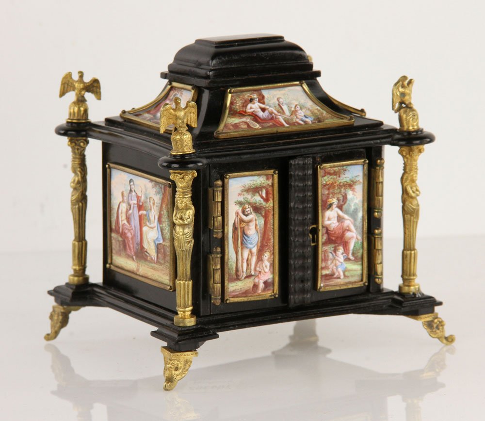 Viennese Enamel Jewelry Casket: Viennese jewelry casket, enamel on copper plaques mounted on wood, having fourteen hand-painted panels with ormolu trim, 6" h x 5 3/4" w x 4 7/8" d. Provenance: from a New York collection.