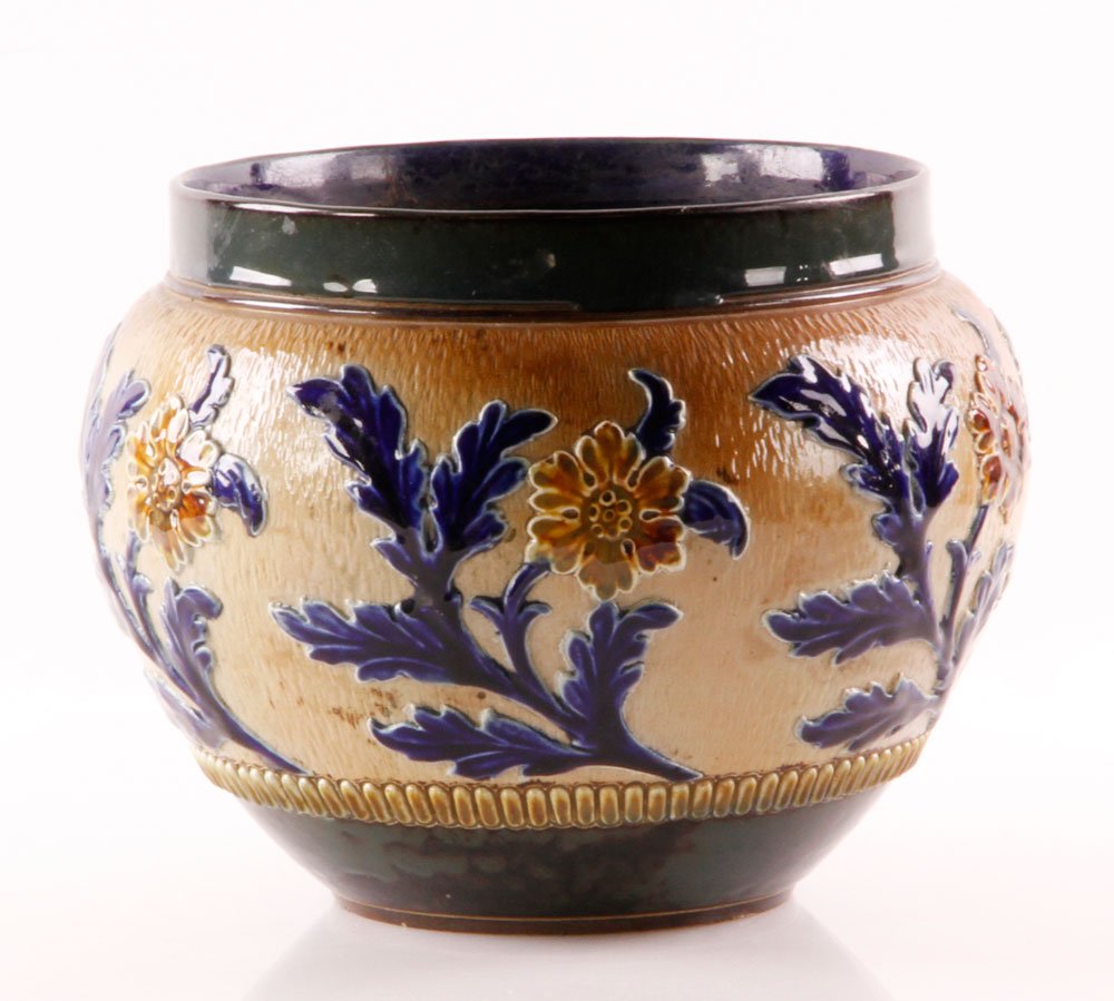 Early 20th C. Doulton Lambeth Flower Pot: Early 20th century Doulton Lambeth flower pot, sand ground with blue leaves and yellow flowers, 8" h x 12" dia. Provenance: From a New York, NY collection.