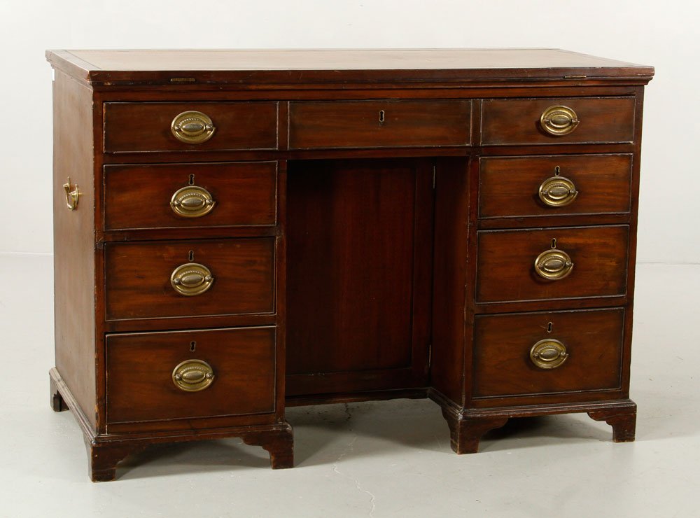 18th C. George III Architect's Desk: 18th century George III ratchet top architect's desk, with leather writing surfaces, having single door and seven drawers, 33" h x 23" d x 48" w. Provenance: From a New Jersey estate.