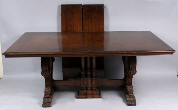 Renaissance Style Walnut Dining Table: Renaissance-style walnut dining table, early 20th century, with two leaves, 30" h x 72" w x 45" d; 96" w (with both leaves), 12" w (each leaf). Scratches on leaves and table, discoloration to one side