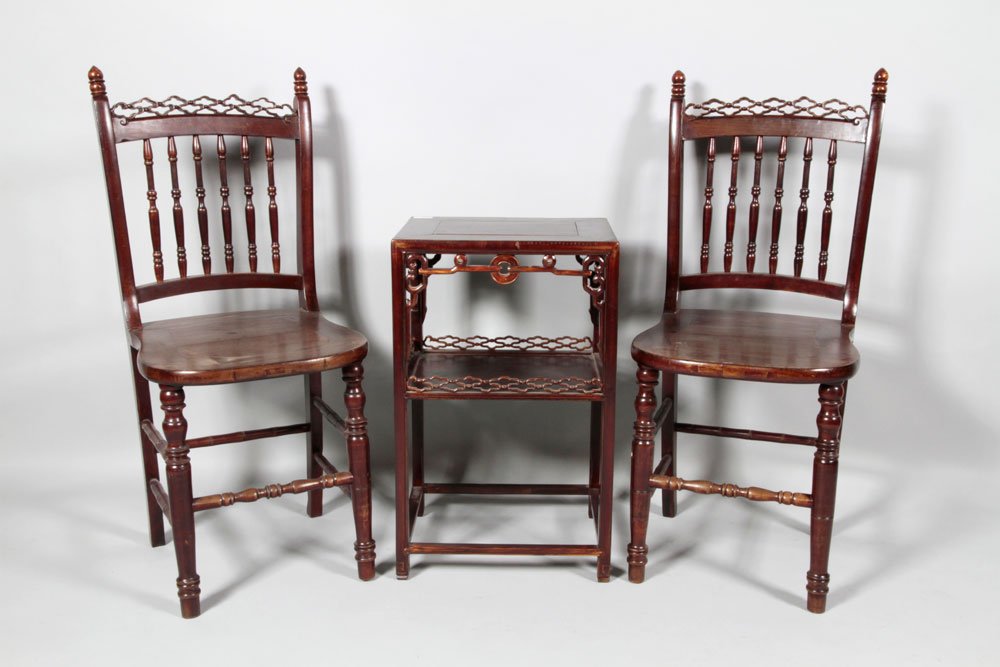 Pr. Chinese Chairs and Table: Table and pair of chairs, Chinese, 20th century, pine wood, carved in French furniture style, with pierced mesh design, chairs with spindle back, the apron of the table with pierced coin and ruyi moti