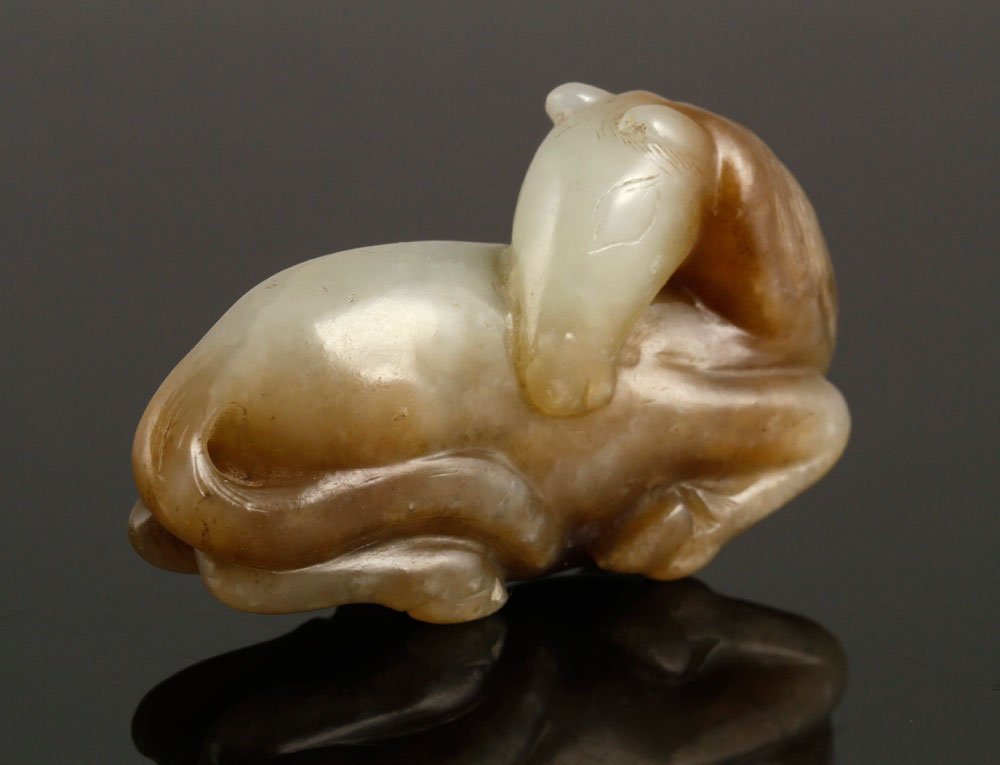 Ming Dynasty Jade Horse: Recumbent horse, China, Ming Dynasty, jade, 1 1/8" h x 2" w. Provenance: From a Wayland, Massachusetts estate.