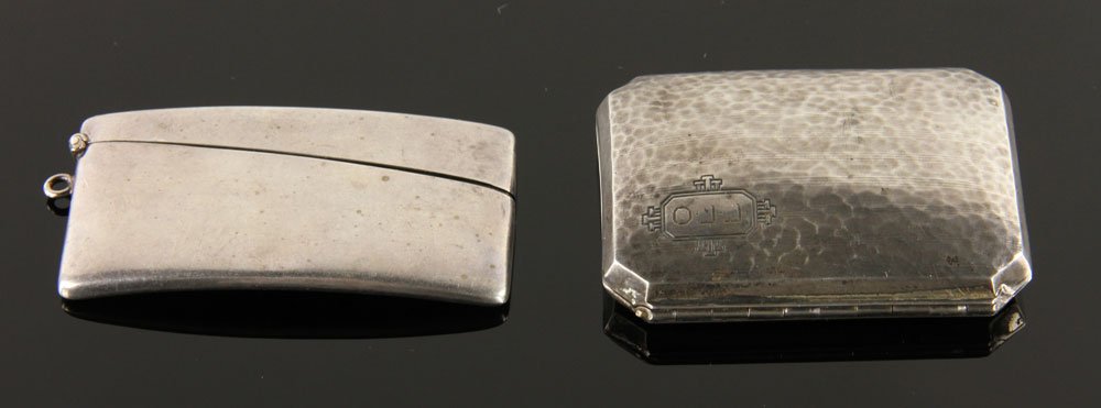 Two Sterling Cases: American cigarette case and card case, both sterling silver, 2" h (larger), approximately 3.1 troy oz total weight. Provenance: from the lifelong collection of a Kansas City, Missouri family.