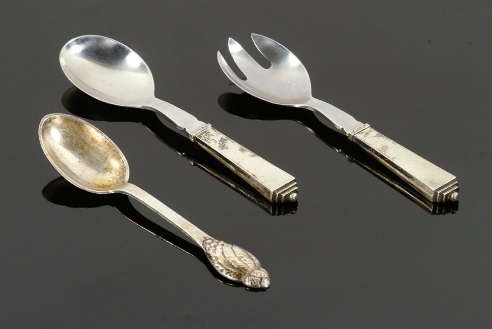 Georg Jensen Serving Utensils: Georg Jensen Danish serving spoons and fork, sterling silver, having single berry design, approximately 2.3 troy oz total weight (allowing .5 oz for each piece with stainless parts). Provenance: from 