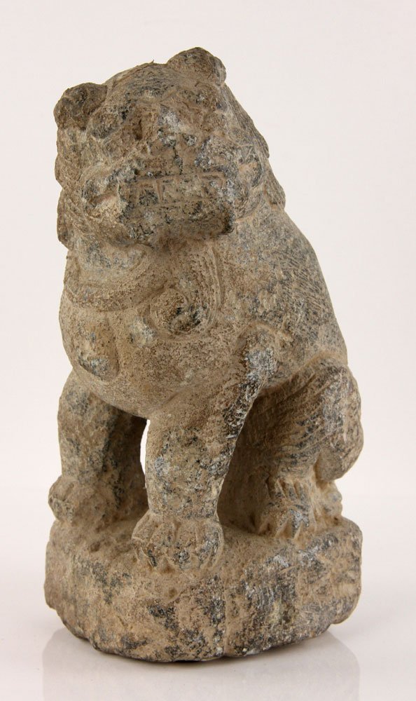 Chinese Carved Foo Lion: Han Dynasty Chinese carved foo lion, stone, 8 1/2" h. Provenance: from the lifelong collection of a Kansas City, Missouri family.