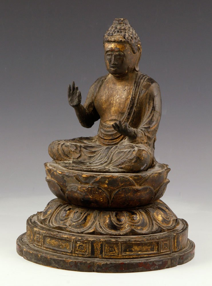 Chinese Carved Wood Buddha: Chinese Ming Dynasty Buddha figure, carved wood with traces of gilt, 11 1/2" h. Provenance: from the lifelong collection of a Kansas City, Missouri family.