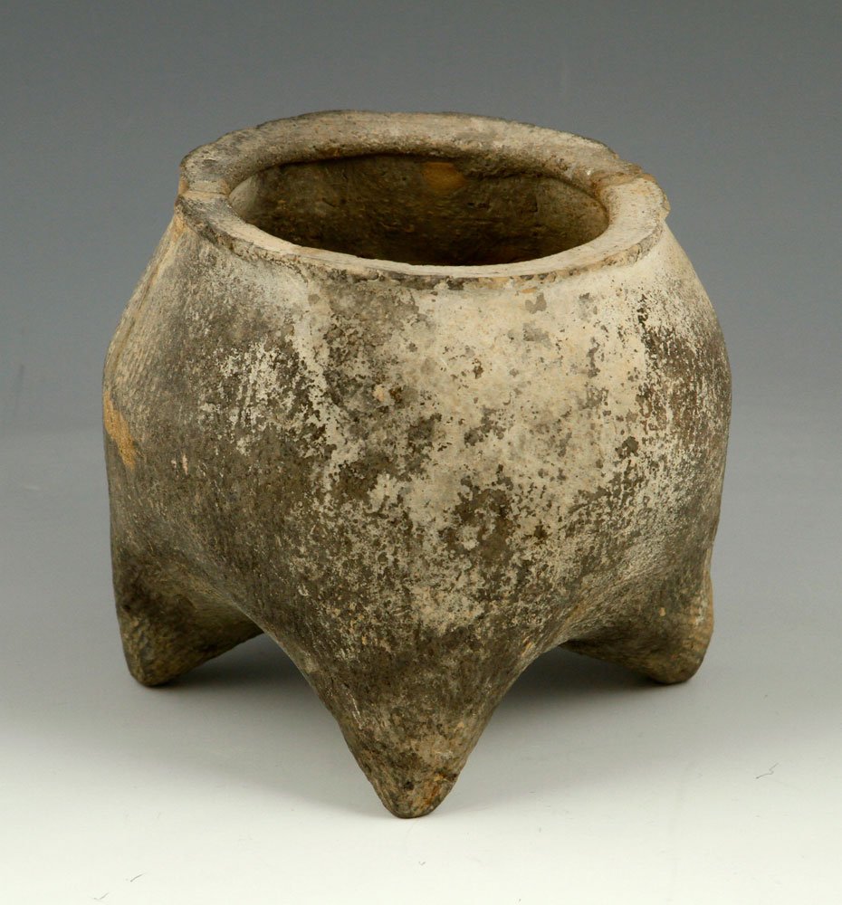 Han Dynasty Li: Chinese Han Dynasty li, or cooking vessel, pottery, having tripod form, 4" h x 3 3/4" dia. Provenance: from the lifelong collection of a Kansas City, Missouri family.