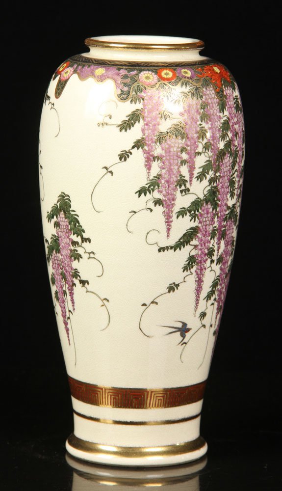 Japanese Bizen Vase: Japanese vase, bizan ware, having cascading wisteria decoration, signed, 8 3/4" h. Provenance: from the lifelong collection of a Kansas City, Missouri family.