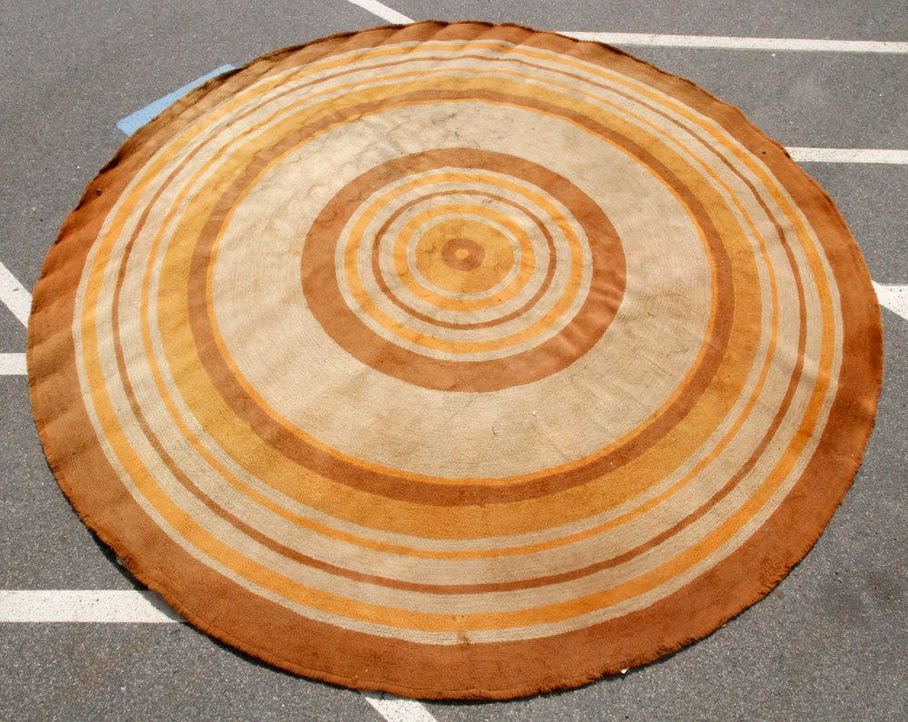 Edward Fields Carpet: Mid century Edward Fields tan carpet, 12' 5" dia. Provenance: From a California estate.