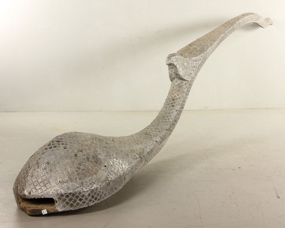 Asian Carved Temple Finial: Southeast Asian decorative temple finial, carved wood with silver paint, possibly Indonesian, 153" h x 18" w, having base, 36" w x 42" d. Provenance: from the estate of interior designer Thomas Britt.