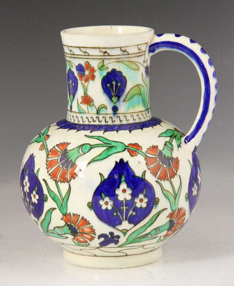 Deck Persian-Style Pitcher: Theodore Deck pitcher, decorated in Persian style, 8" h x 6 1/2" dia. Provenance: from a Florida estate.