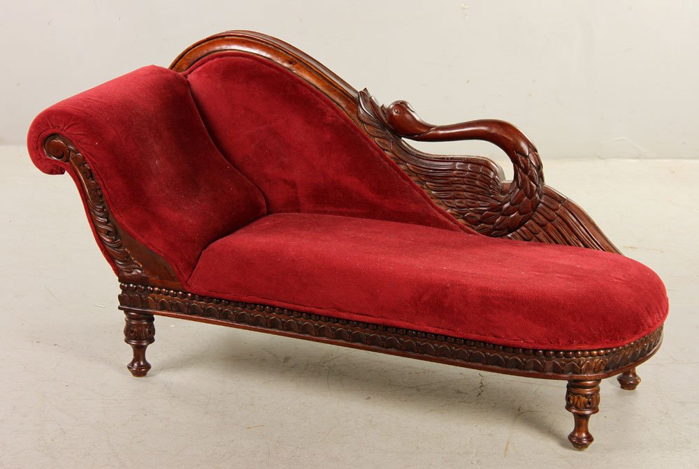 Empire Style Diminutive Chaise Lounge: Empire style diminutive chaise lounge, with carved swan back, 18" h x 35" w x 15" d. Provenance: From the personal lifetime collection of Mark Avner of Lake Worth, FL and Buffalo, NY.