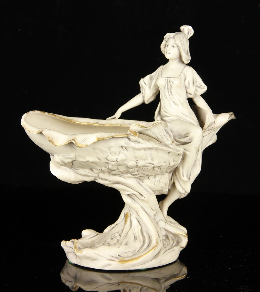 Royal Dux Art Nouveau Statue: Royal Dux Art Nouveau statue, woman sitting on lily pad, 10" h x 10"w. Provenance: From the personal lifetime collection of Mark Avner of Lake Worth, FL and Buffalo, NY.