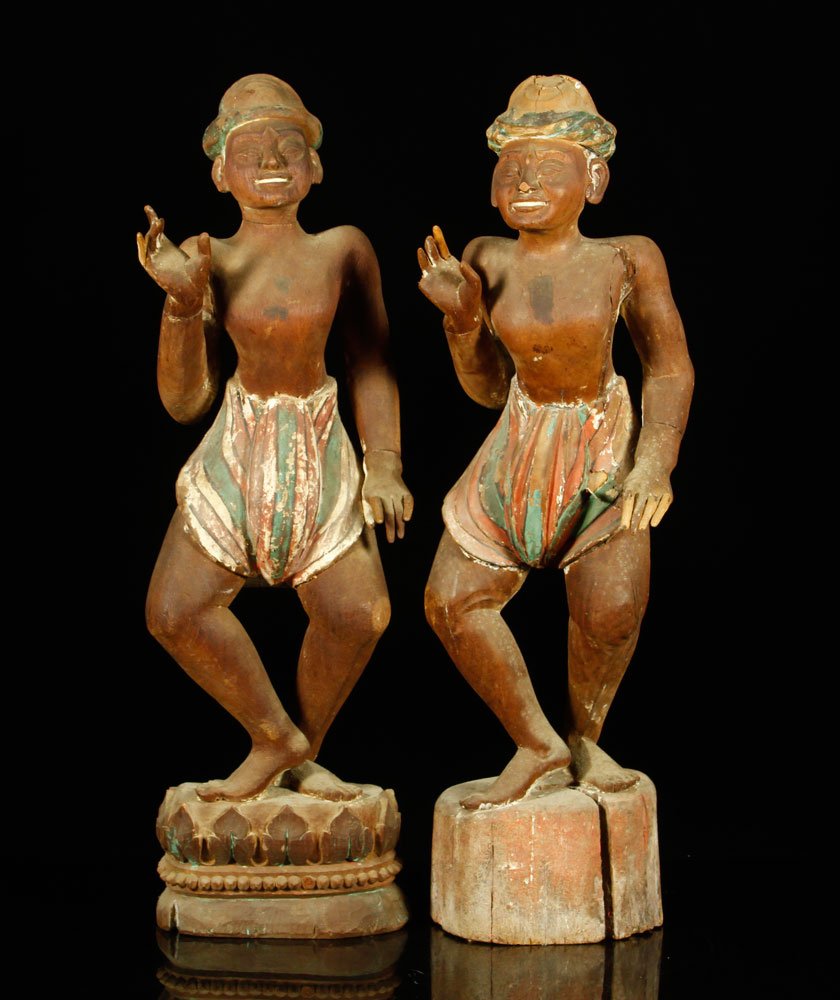 Pr. 19th C. Indonesian Carved Figures: Pair of Indonesian figures, 19th century, carved and polychromed wood, 28 1/2" h. Provenance: From a New York estate.