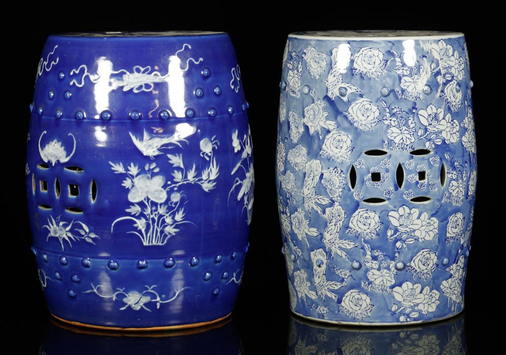 2 Chinese Blue and White Porcelain Garden Seats: Lot of two garden seats, Chinese, early 20th century, blue and white decorated porcelain, measuring 18 1/2" h and 16 1/2" h. Provenance: From a Massachusetts estate.