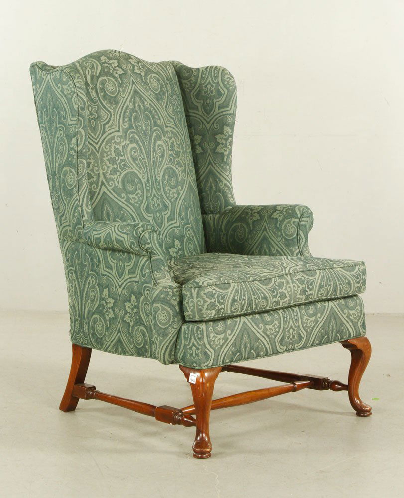 Upholstered Wingback Chair: Wingback chair, with green upholstery and cabriole legs, 20th century, 44" h x 31 1/2" w x 29 1/2" d. Provenance: From a New Hampshire estate.