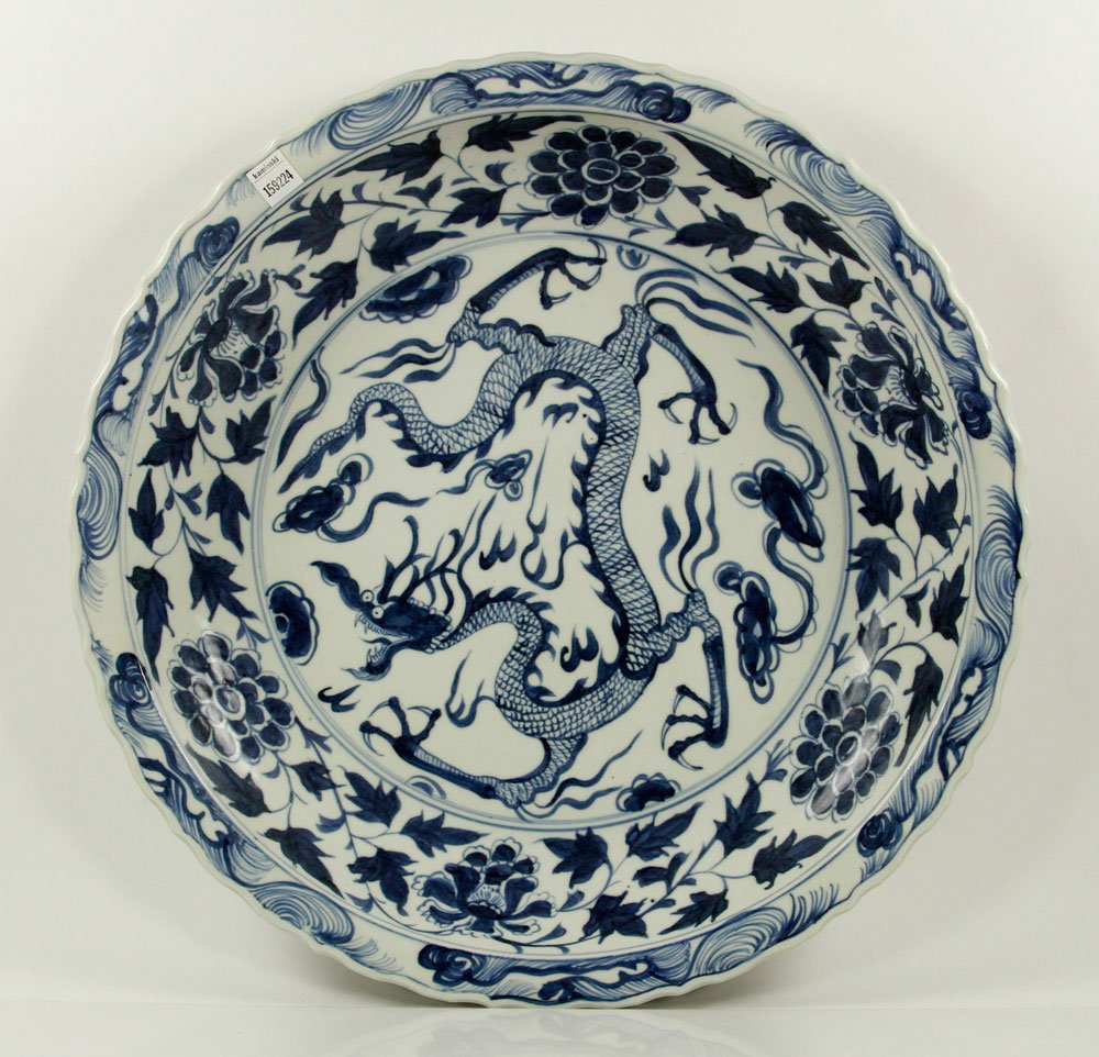 Chinese Ming Dynasty Style Blue and White Charger: Ming Dynasty-style blue and white porcelain charger, Chinese, embellished with three-clawed dragon motif, 23 1/4" dia.