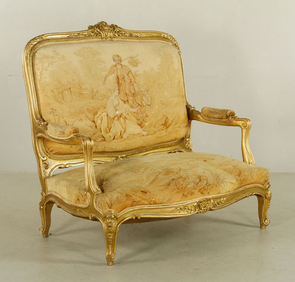 19th C. French Louis XV Style Settee: Louis XV-style armed settee, French, 19th century, with tapestry upholstery, 48" h x 50" l x 35" d. Provenance: From a Massachusetts estate.